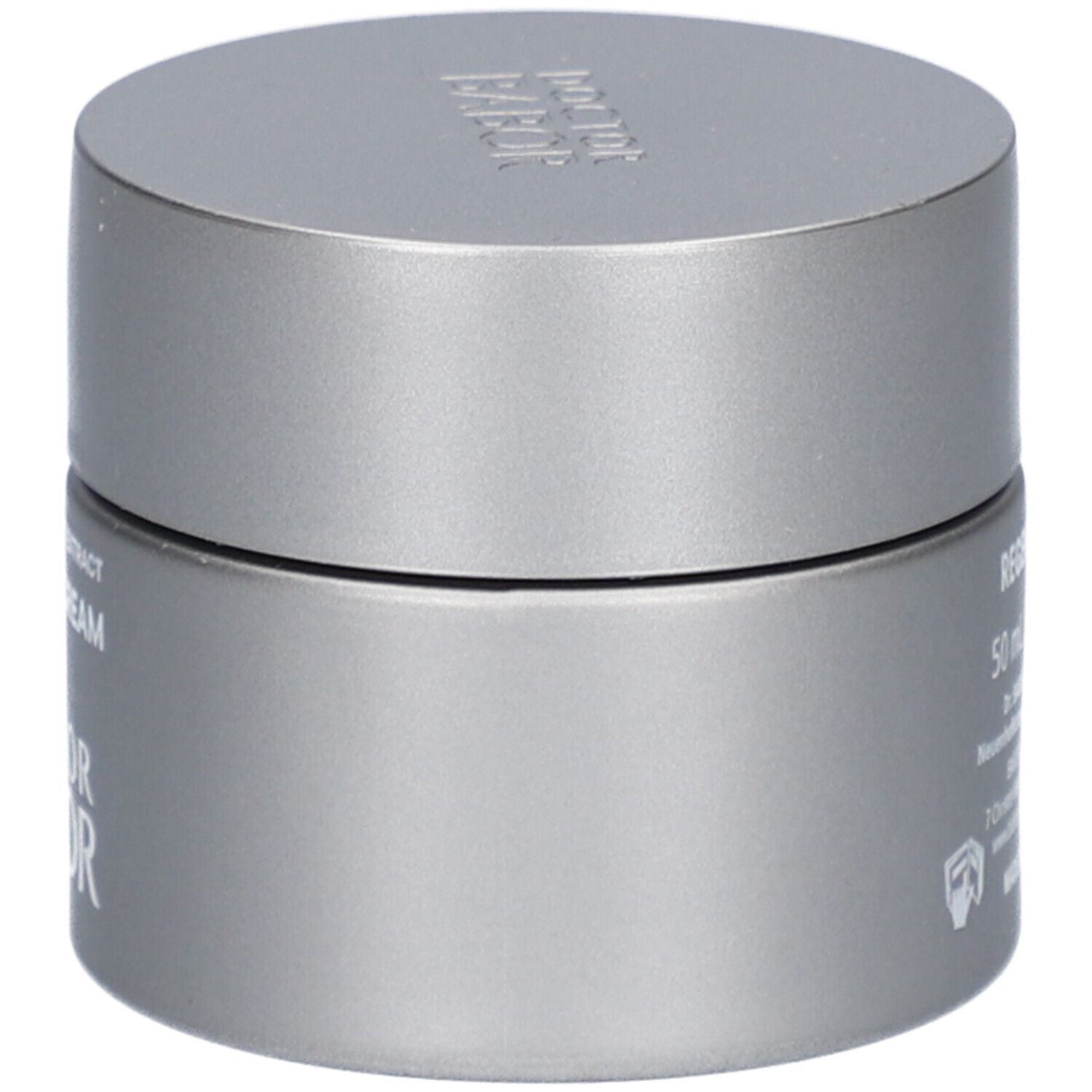 Graue Creme-Dose mit Deckel. Aufschrift: The Cure Cream, Doctor Babor. Produktinformationen auf der Seite.