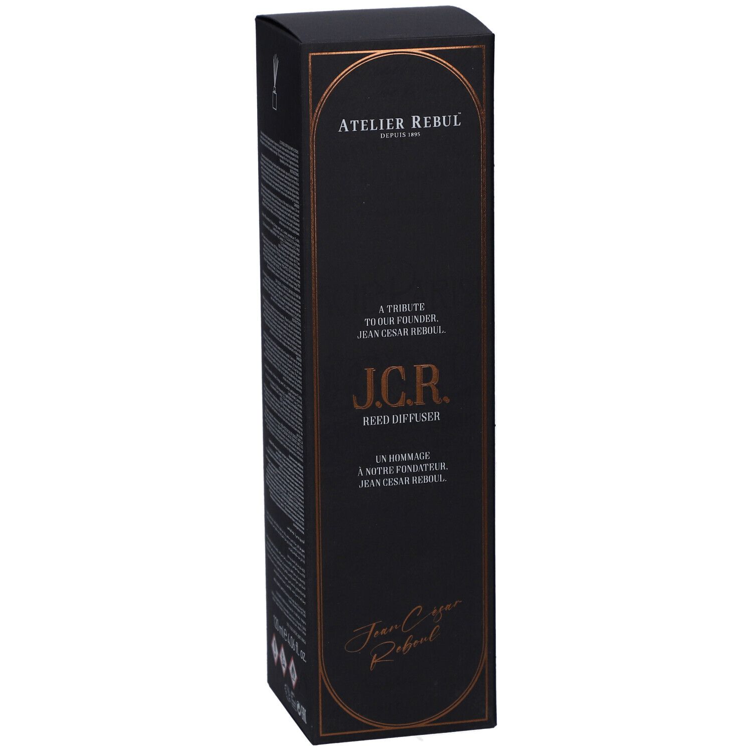 Schwarze rechteckige Schachtel. Aufschrift: Atelier Rebul, J.C.R. Reed Diffuser. Goldfarbene Schrift.