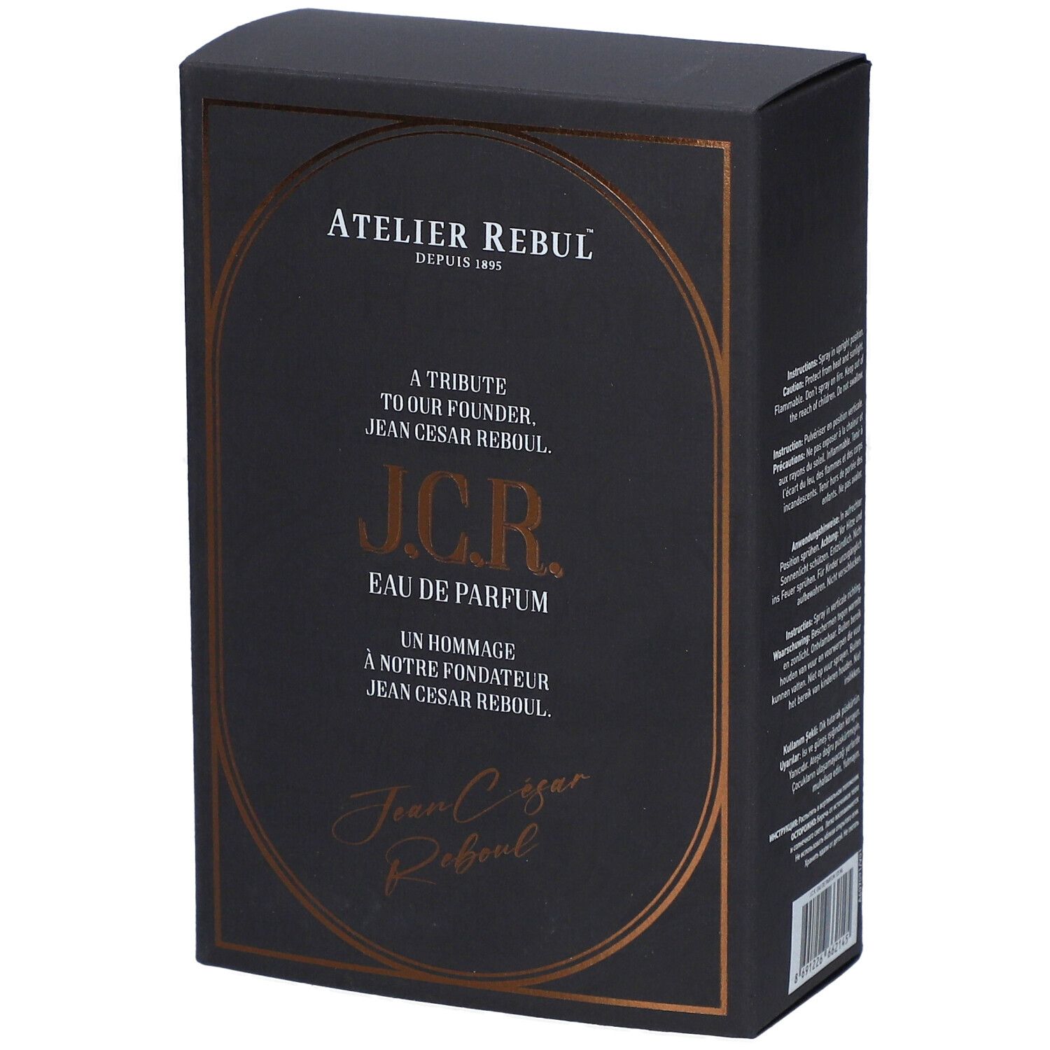 Schwarzer Karton mit goldfarbenem Rahmen. Text: Atelier Rebul, J.C.R. Eau de Parfum. Aufschrift: A Tribute to our Founder Jean Cesar Rebul.