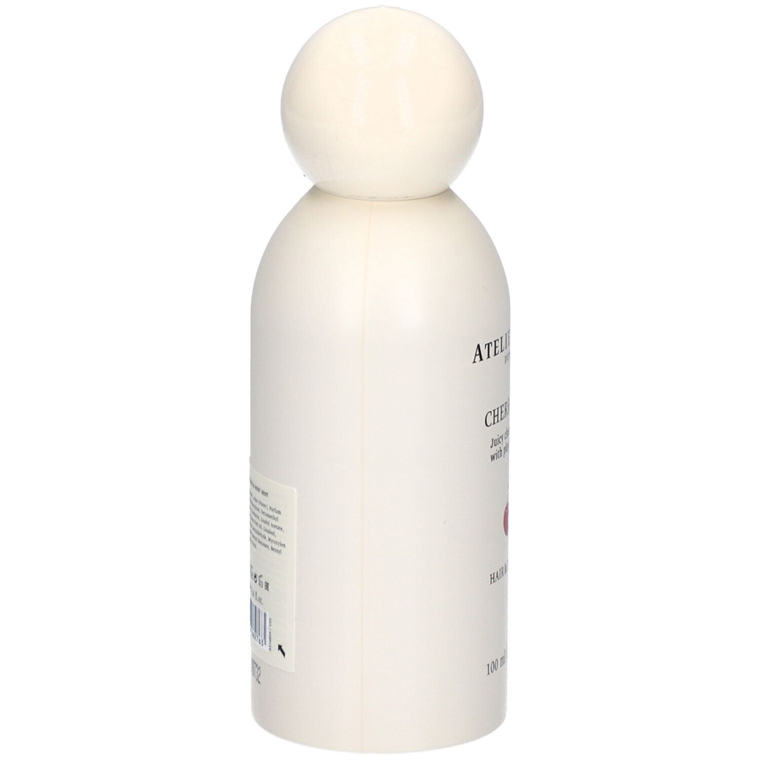 Weiße Flasche mit rundem Verschluss. Seitenansicht. Aufschrift: Atelier Rebul, Cherry Me Up, Hair & Body Mist. Text auf Etikett.