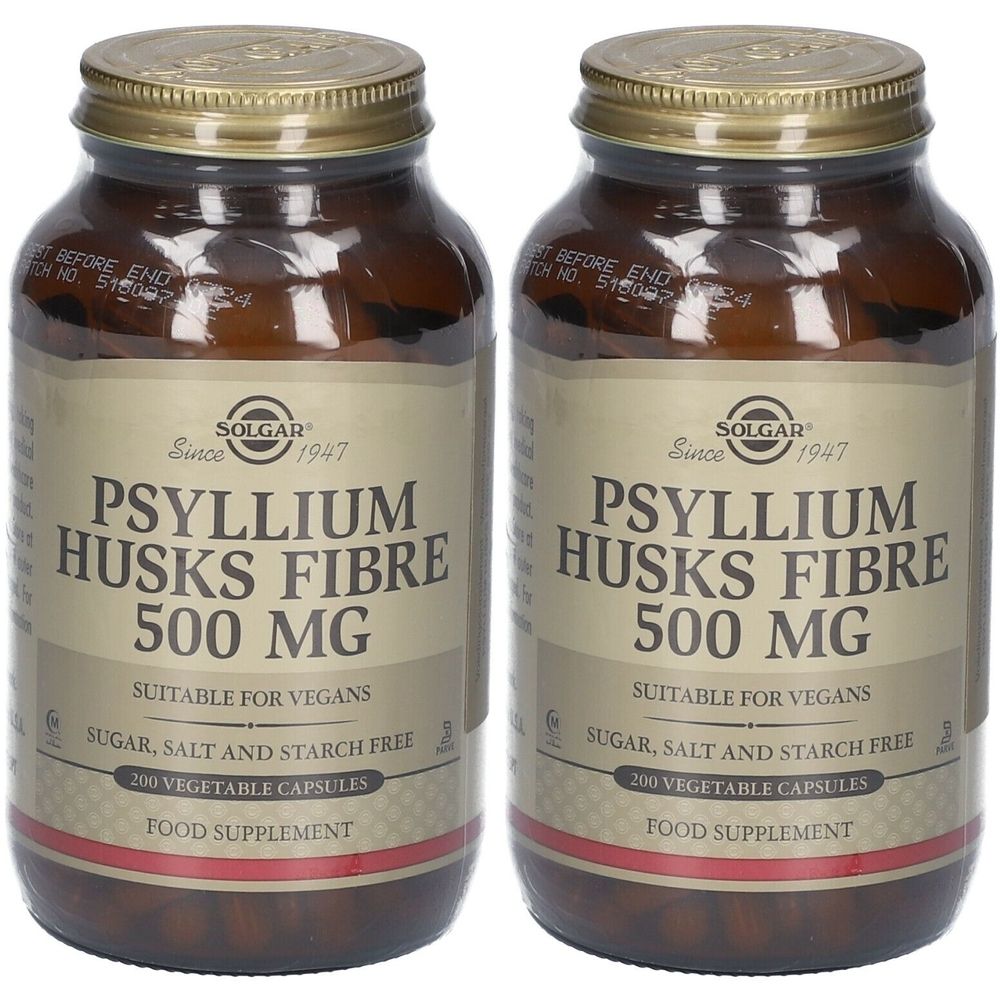 Zwei Flaschen Solgar Psyllium Husks Fibre 500 mg. Braune Glasflaschen mit goldenen Deckeln und Etiketten.