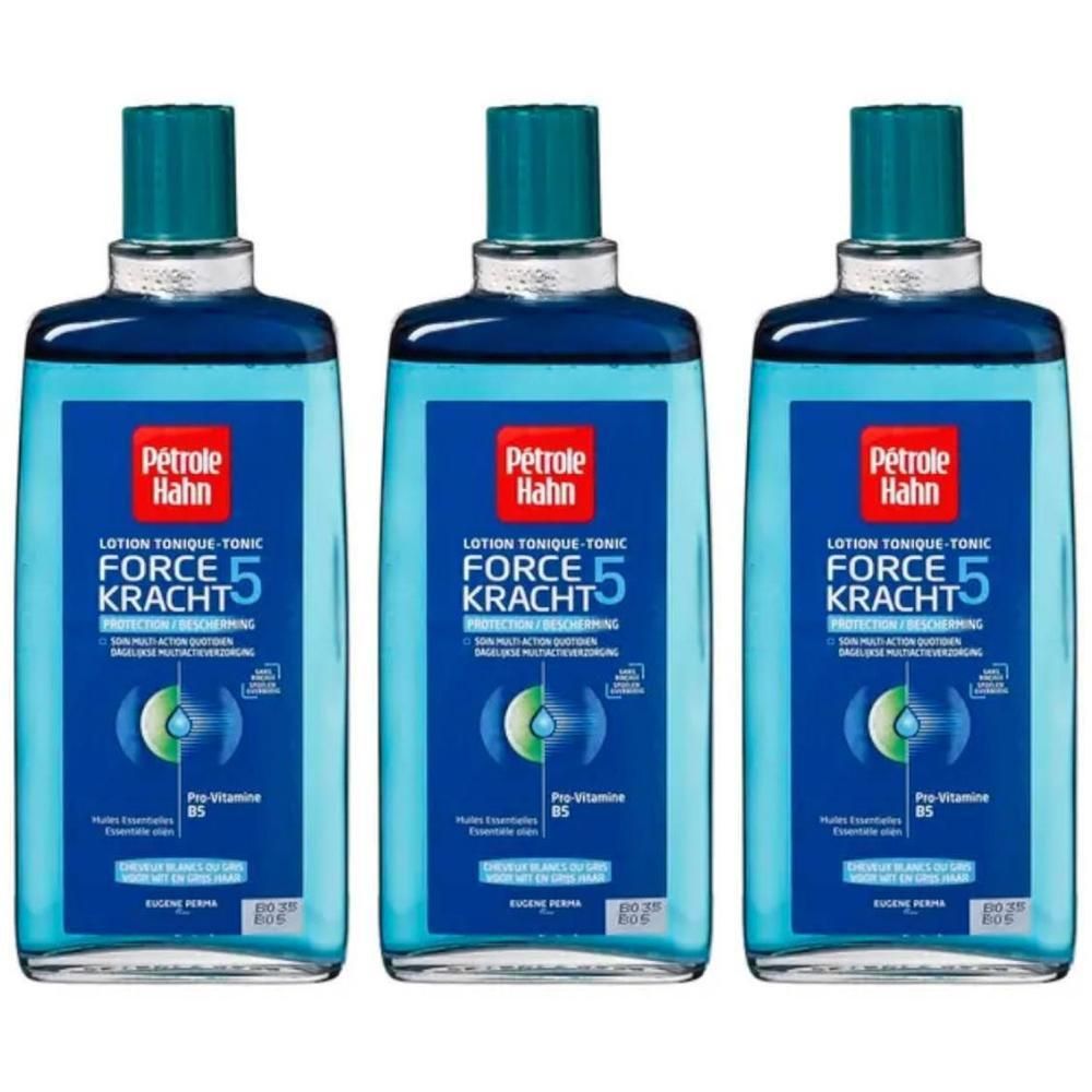 Drei Flaschen Pétrole Hahn Force Kracht 5. Blaue Flüssigkeit, türkisfarbener Deckel. Aufschrift: Lotion Tonique, Pro-Vitamine B5.