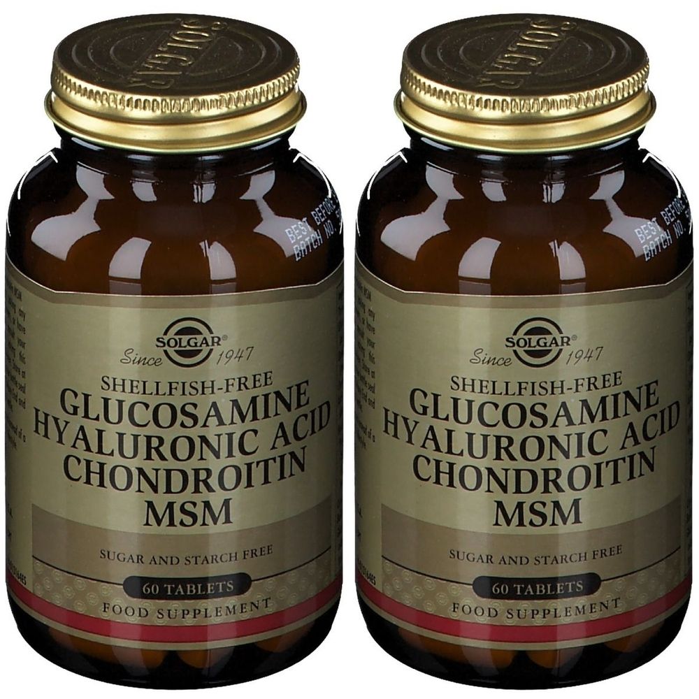 Deux flacons SOLGAR® avec l'inscription GLUCOSAMINE HYALURONIC ACID CHONDROITIN MSM. Flacons en verre brun avec bouchons et étiquettes dorés.