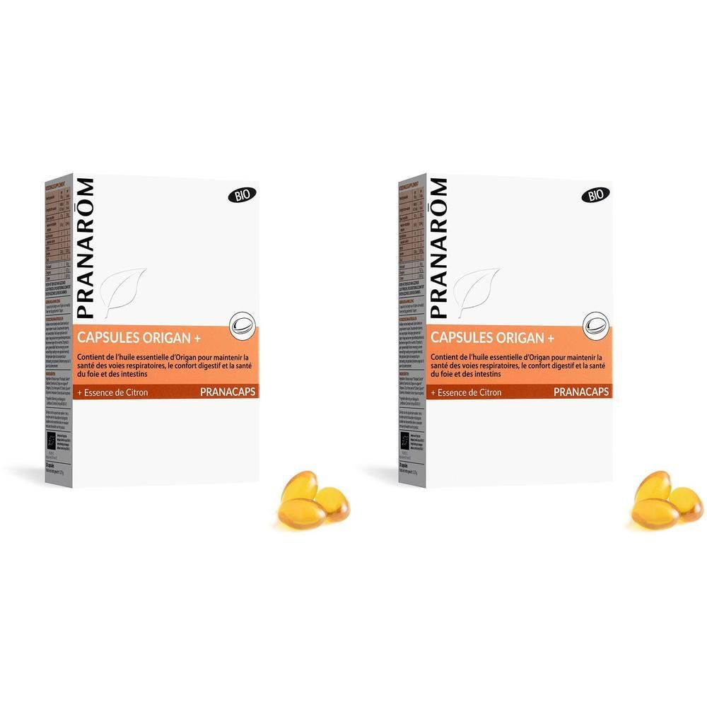 Zwei Schachteln mit Kapseln. Aufschrift: Pranarom, Capsules Origan +, Essence de Citron. Gelbe Kapseln liegen daneben.