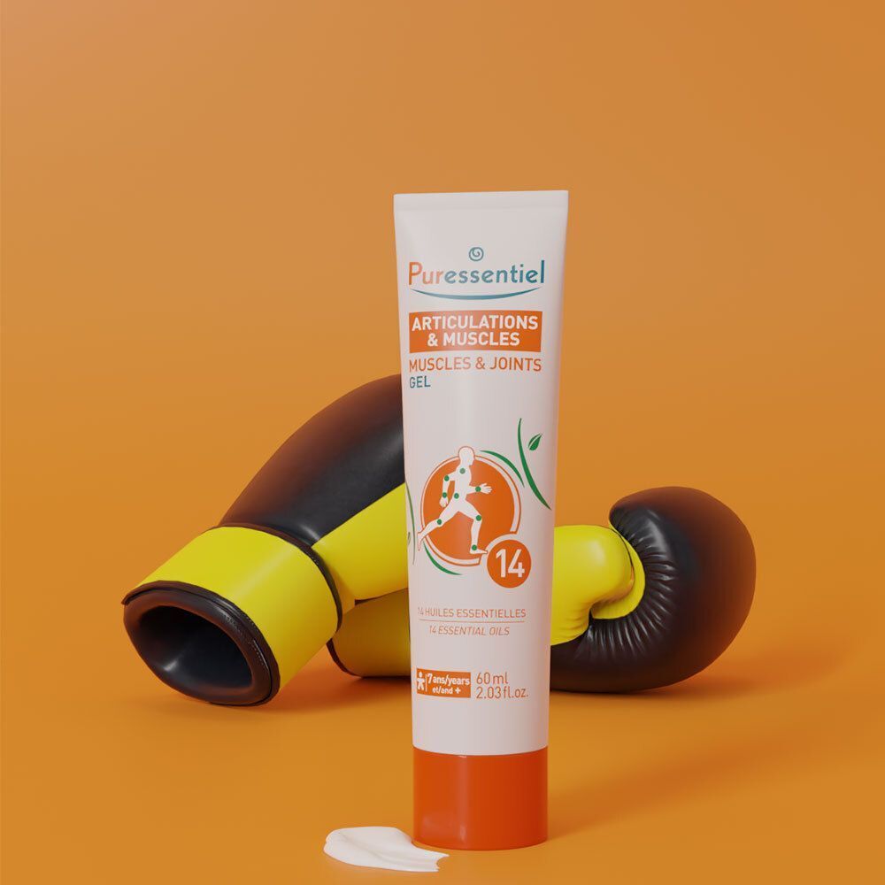 Tube mit Produktname und Logo. Gel für Gelenke und Muskeln. Boxhandschuhe im Hintergrund.