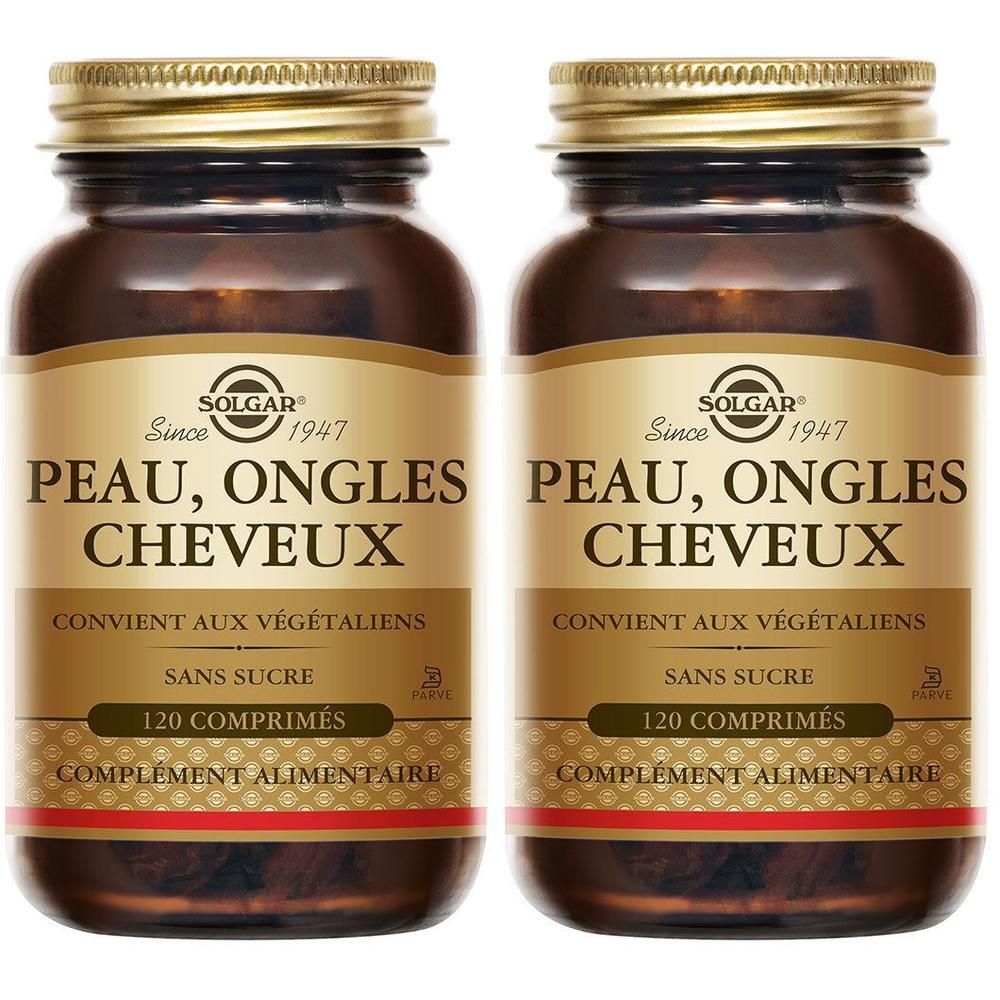 Zwei Flaschen Solgar Skin, Nails and Hair Formula. Braune Glasflaschen mit goldenen Deckeln. Aufschrift: PEAU, ONGLES, CHEVEUX.