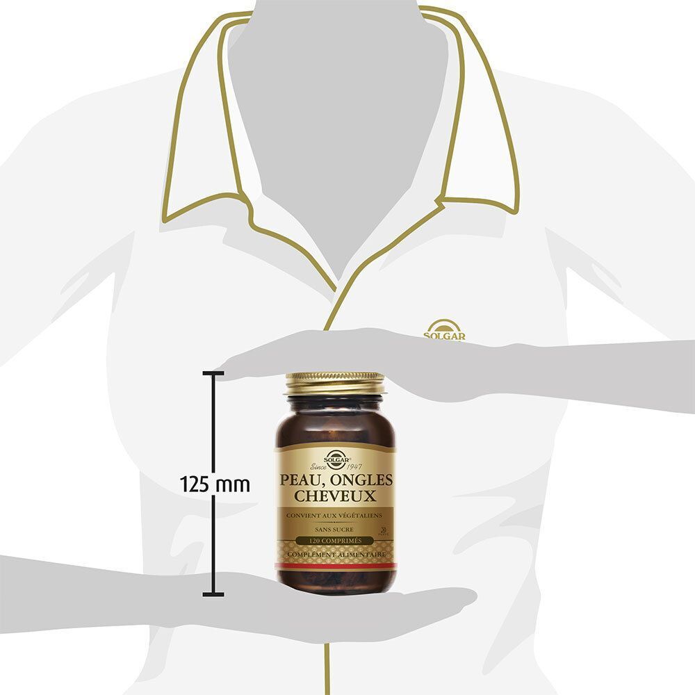 Braune Glasflasche mit goldfarbenem Deckel. Aufschrift: PEAU, ONGLES, CHEVEUX. 125 mm hoch, gemessen von einer Person.