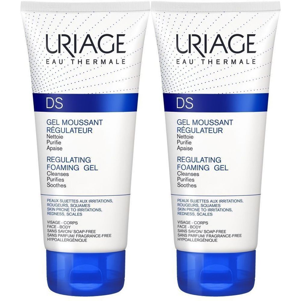 Deux tubes de gel moussant Uriage DS. Blanc, bleu et bleu foncé. Texte: DS, Gel Moussant Régulateur, Regulating Foaming Gel.