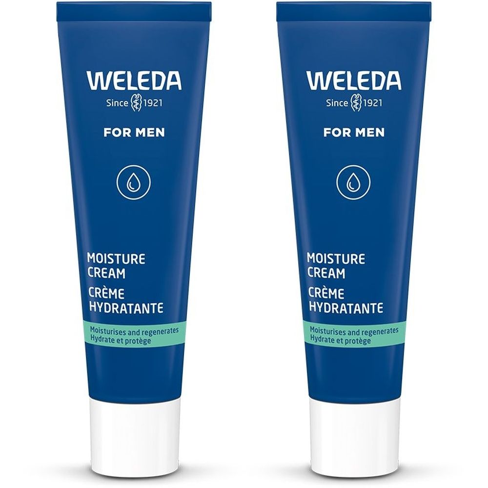 Deux tubes bleus avec bouchon blanc. Inscription: WELEDA, FOR MEN, MOISTURE CREAM, CRÈME HYDRATANTE. Souligné en vert: Hydrate et protège.