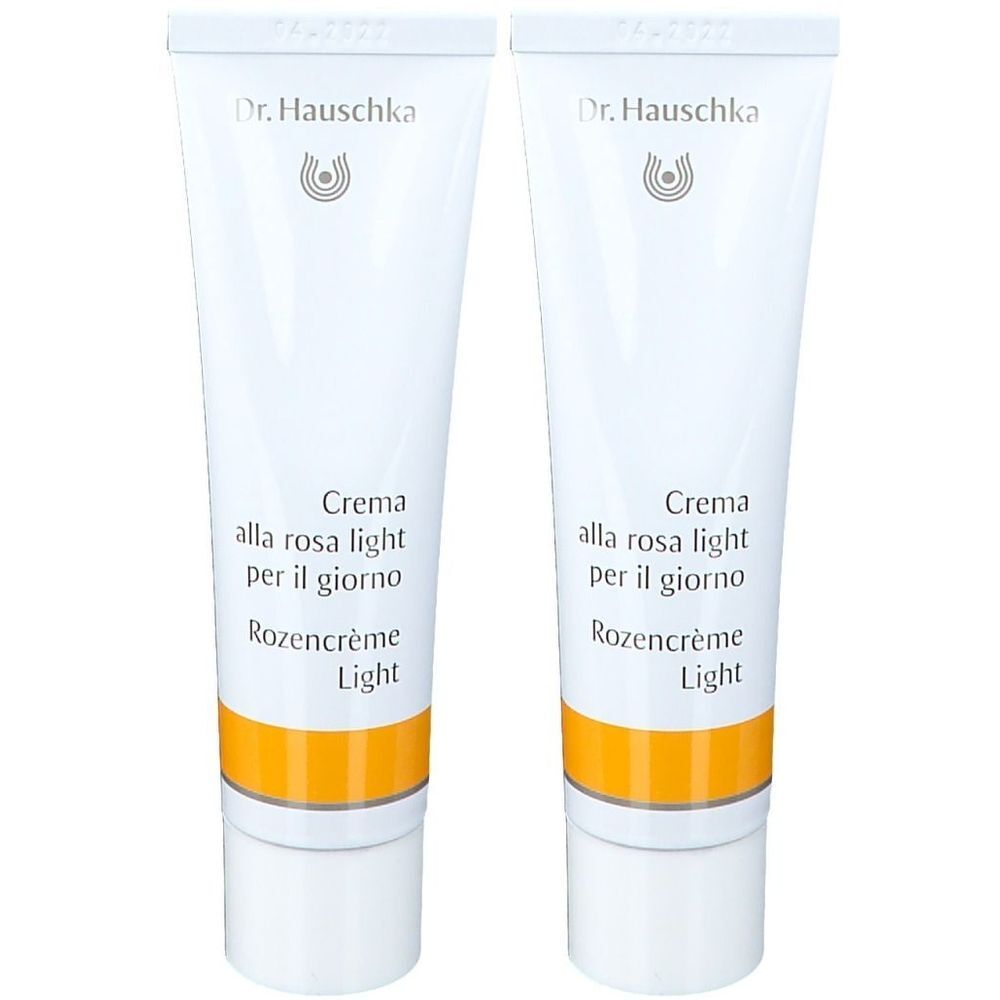 Deux tubes de crème. Inscription : Dr. Hauschka, Crema alla rosa light per il giorno, Rozencrème Light.