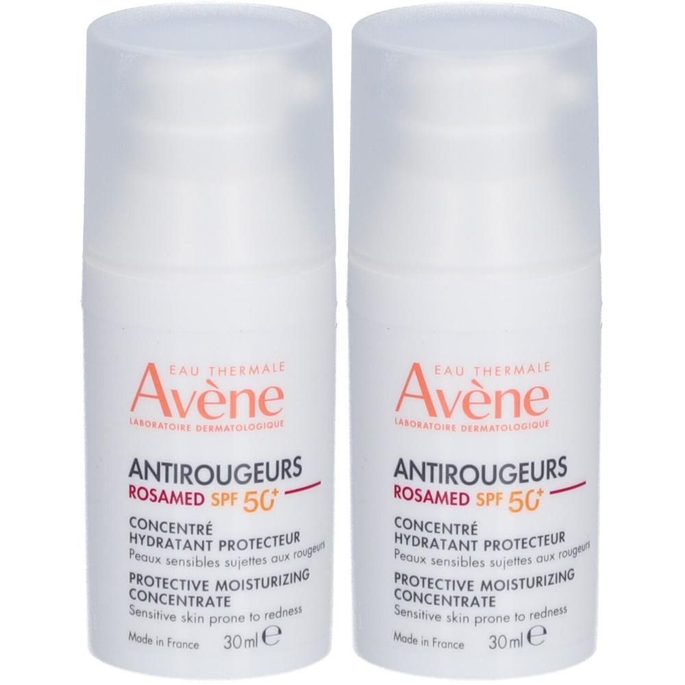 Zwei weiße Flaschen mit Sprühkopf. Aufschrift: Avène Antirougeurs ROSAMED SPF 50+ Feuchtigkeitsspendendes Schutzkonzentrat.
