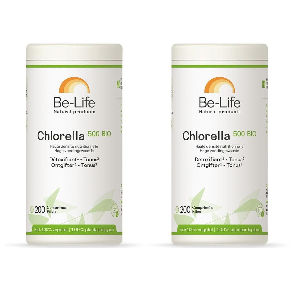Zwei weiße Dosen mit grüner Schrift. Aufschrift: Be-Life Chlorella 500 BIO. 200 Tabletten. Logos.