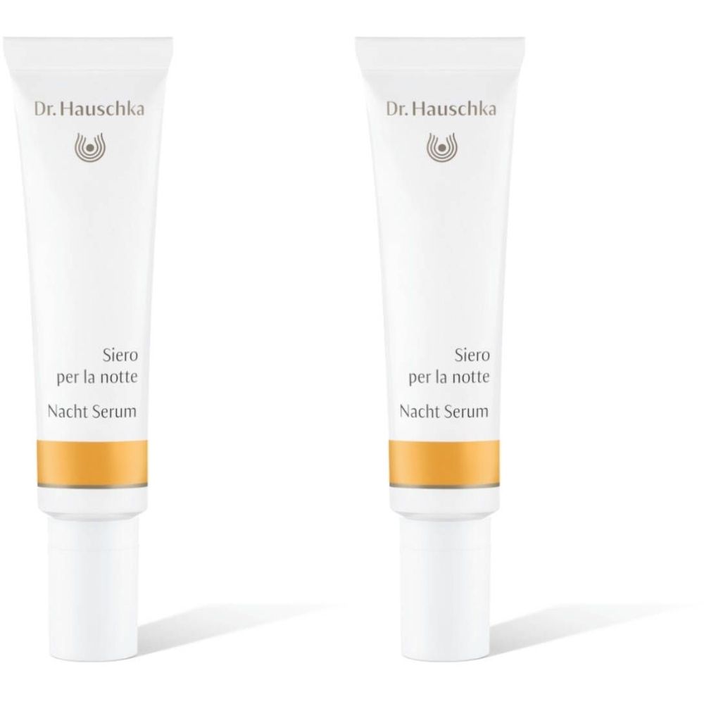 Zwei Tuben Dr. Hauschka Nacht Serum. Weiße Tuben mit gelbem Streifen und Schriftzug.