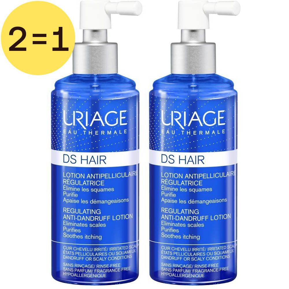 Zwei Flaschen Uriage DS Hair Lotion. Blaue Flaschen mit weißem Sprühkopf. Aufschrift: Anti-Schuppen Lotion. Gelbes Etikett: 2=1.