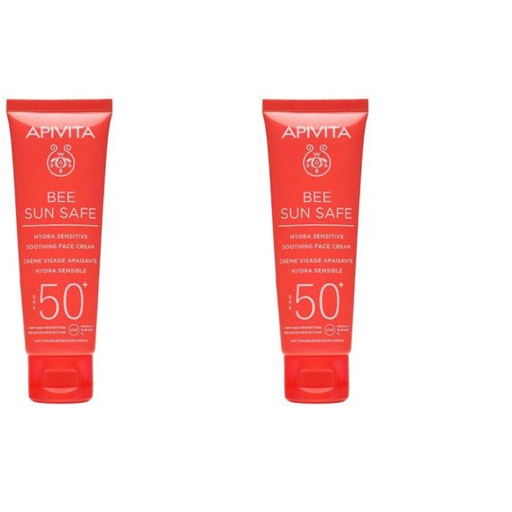 Deux tubes de crème visage Apivita Bee Sun Safe SPF50+. Emballage rouge, texte blanc. Marque et nom du produit visibles.