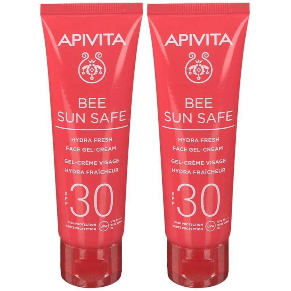 Deux tubes de gel-crème Apivita Bee Sun Safe. Tubes rouges avec texte blanc. SPF 30. Logo et nom du produit.