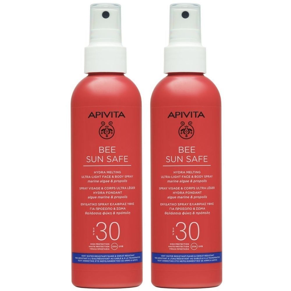 Deux flacons rouges avec vaporisateur blanc. Inscription: Apivita Bee Sun Safe, SPF30. Algues marines & propolis.