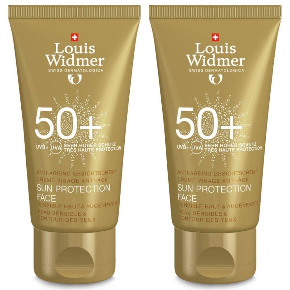 Zwei goldfarbene Tuben Louis Widmer Sonnenschutzgesicht SPF50+. Aufschrift: 50+, Sun Protection Face, für sensible Haut.