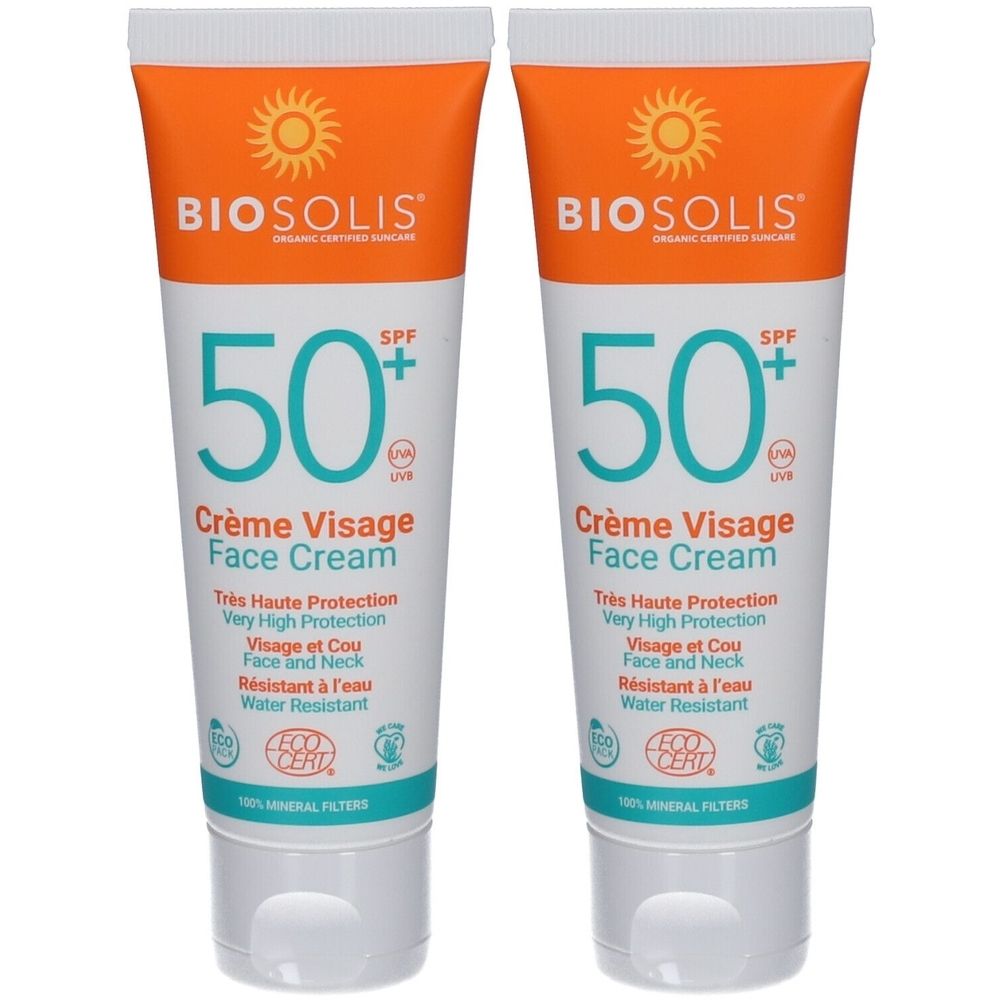 Deux tubes de Crème Visage BIOSOLIS SPF50+. Emballage orange et blanc. Inscription : Crème Visage Face Cream. Label ECO CERT.