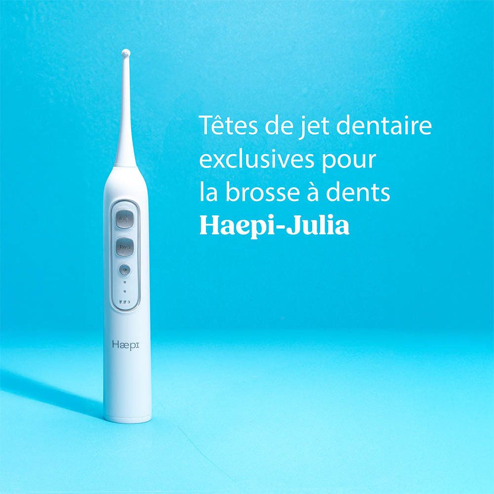 Appareil de douche buccale blanc avec boutons. Texte : Têtes de jet dentaire exclusives pour la brosse à dents Haepi-Julia.