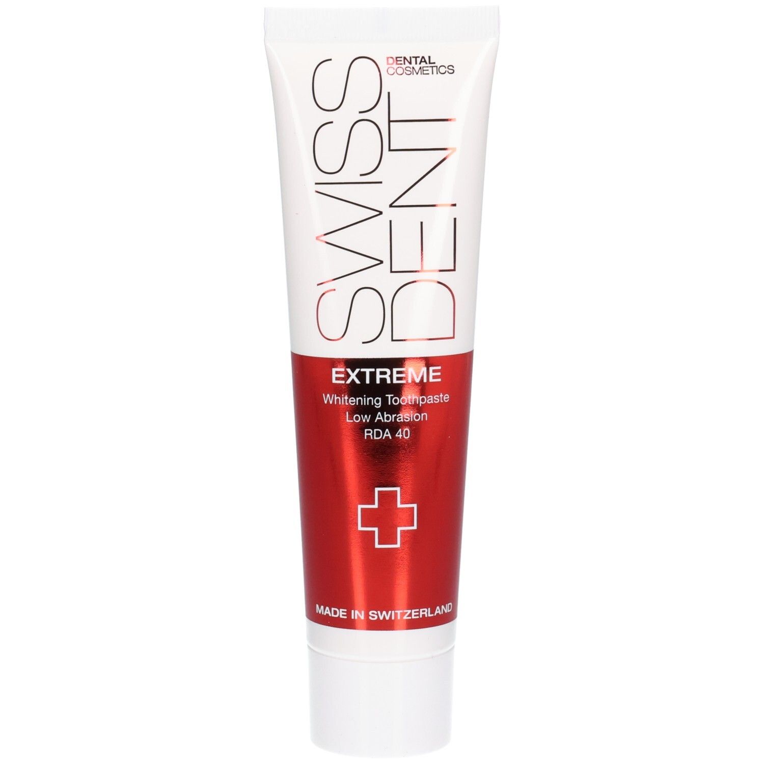 Zahncreme-Tube, weiß-rot. Schriftzug SWISS DENT, EXTREME, Whitening Toothpaste. Rotes Kreuz. Made in Switzerland.
