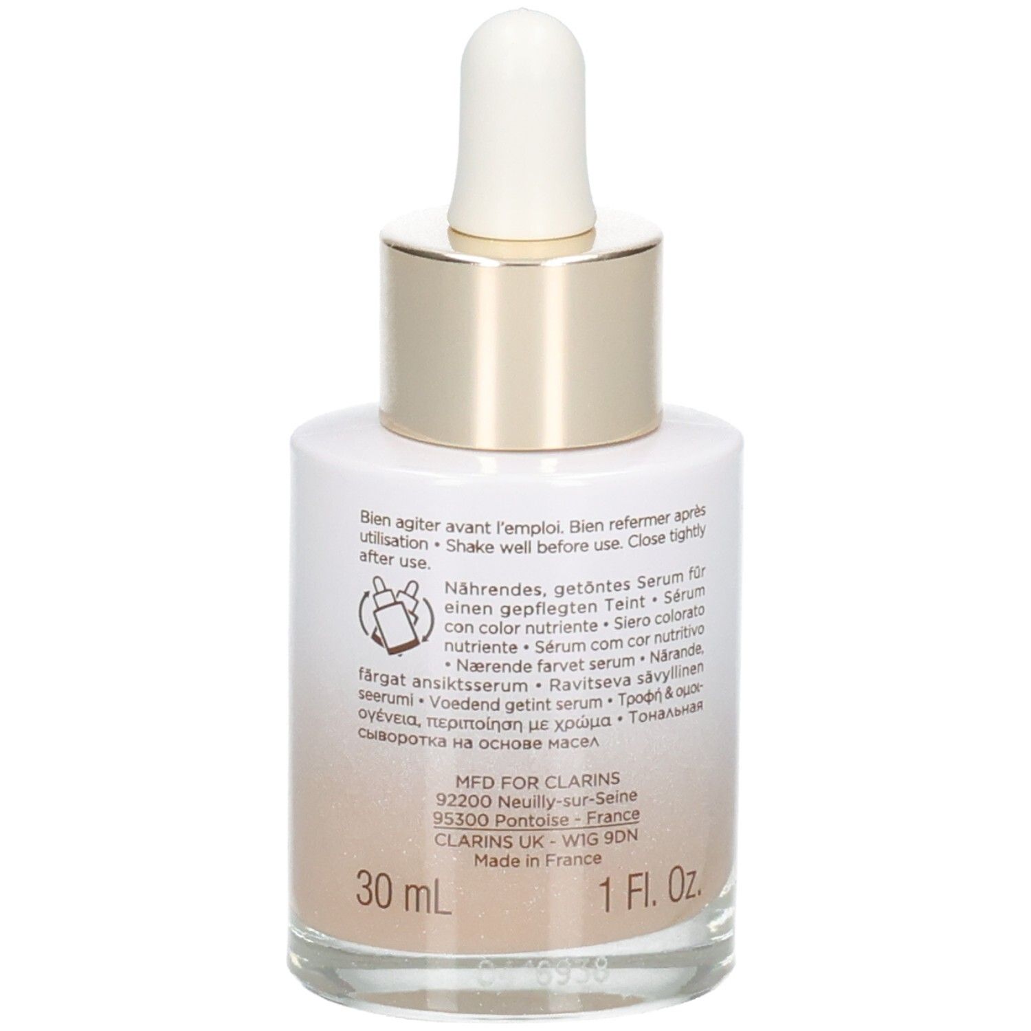 Flacon Clarins Tinted Oleo-Serum, verso avec instructions d'utilisation et mention 30 ml.