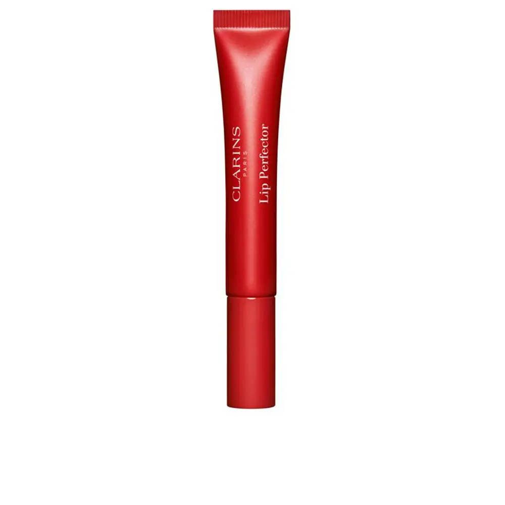 Clarins Lip Perfector 24h dans un tube rouge avec applicateur. Nom du produit et marque visibles.