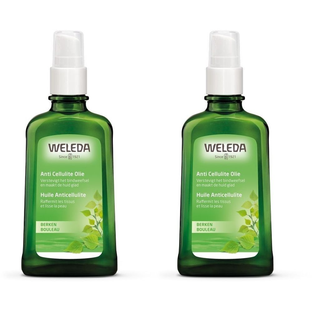 Zwei grüne Flaschen mit Sprühkopf. Aufschrift: WELEDA, Anti Cellulite Olie, Huile Anticellulite. Birken-Blatt-Motiv.