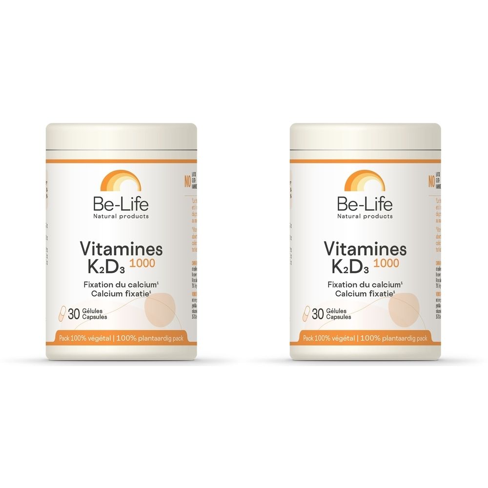 Deux flacons blancs avec étiquette. Inscription: Be-Life, Vitamines K2 D3 1000, 30 gélules. Logo orange.