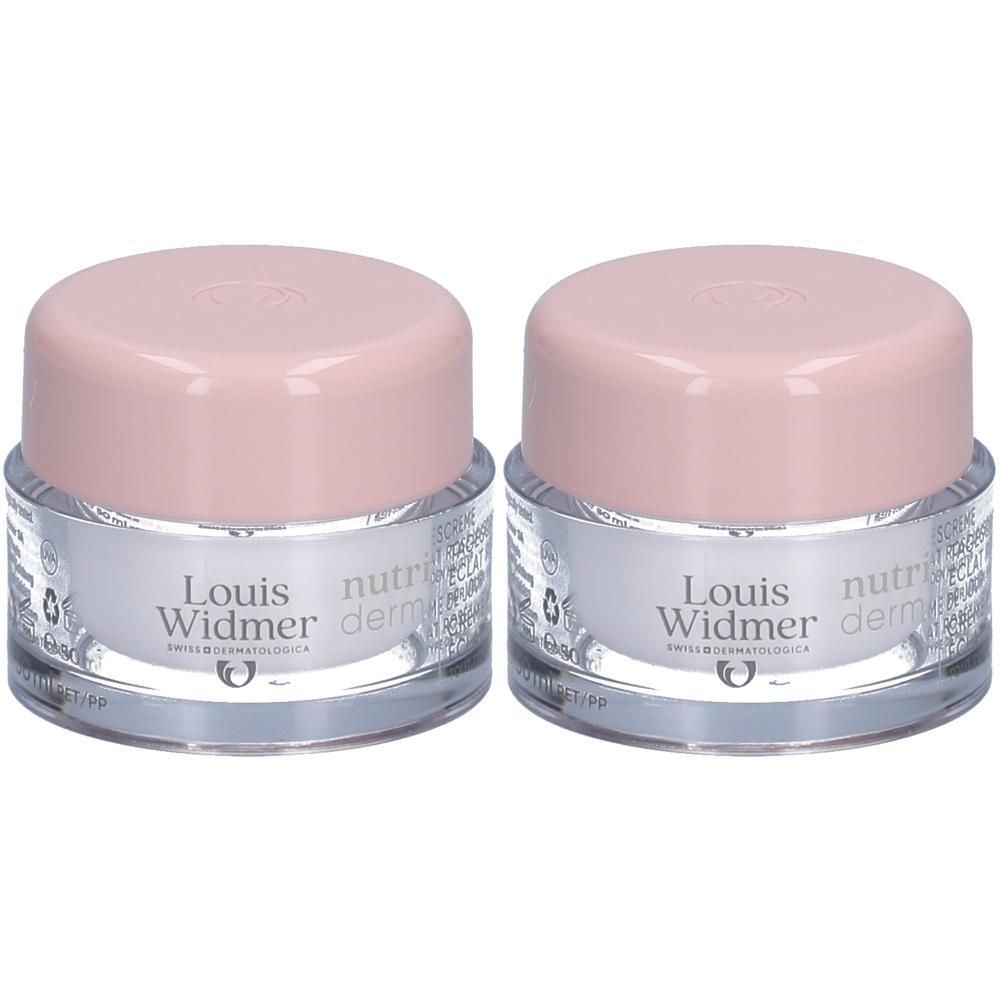 Zwei Tiegel Louis Widmer Nutriderm Crème de Jour Éclat Rosé UV50. Rosa Deckel, silberfarbener Behälter, Produktnamen.