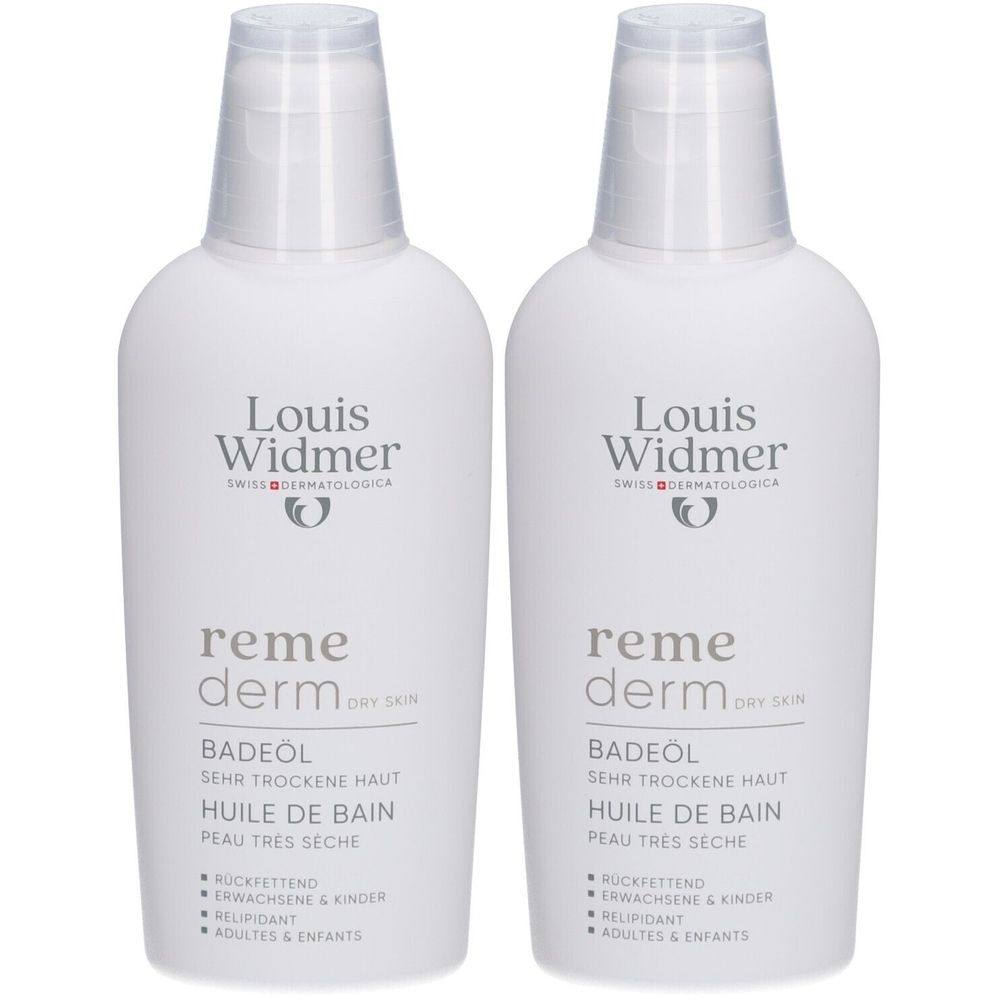 Zwei Flaschen Louis Widmer Remederm Badeöl für trockene Haut. Weiße Flaschen mit Klappverschluss, Produktbezeichnung.