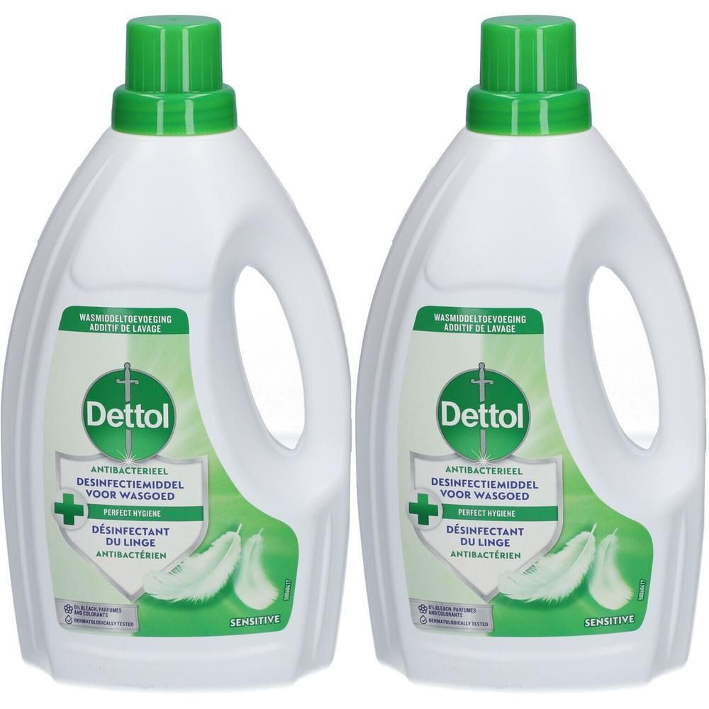 Zwei weiße Plastikflaschen mit grünem Deckel, Dettol antibakterielles Wäsche-Desinfektionsmittel.