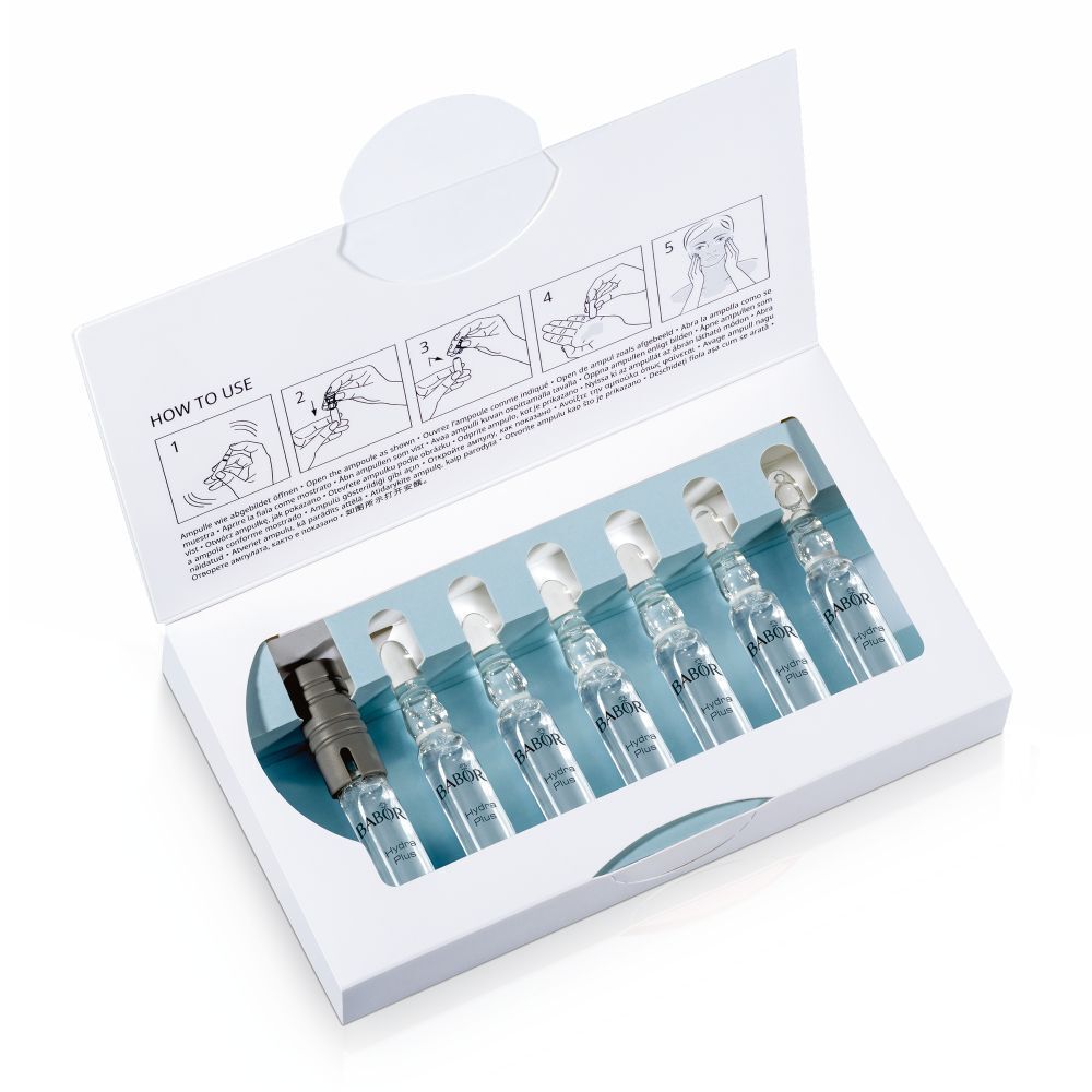 Emballage ouvert avec 7 ampoules Babor Hydra Plus. Instructions d'ouverture illustrées à l'intérieur du couvercle.