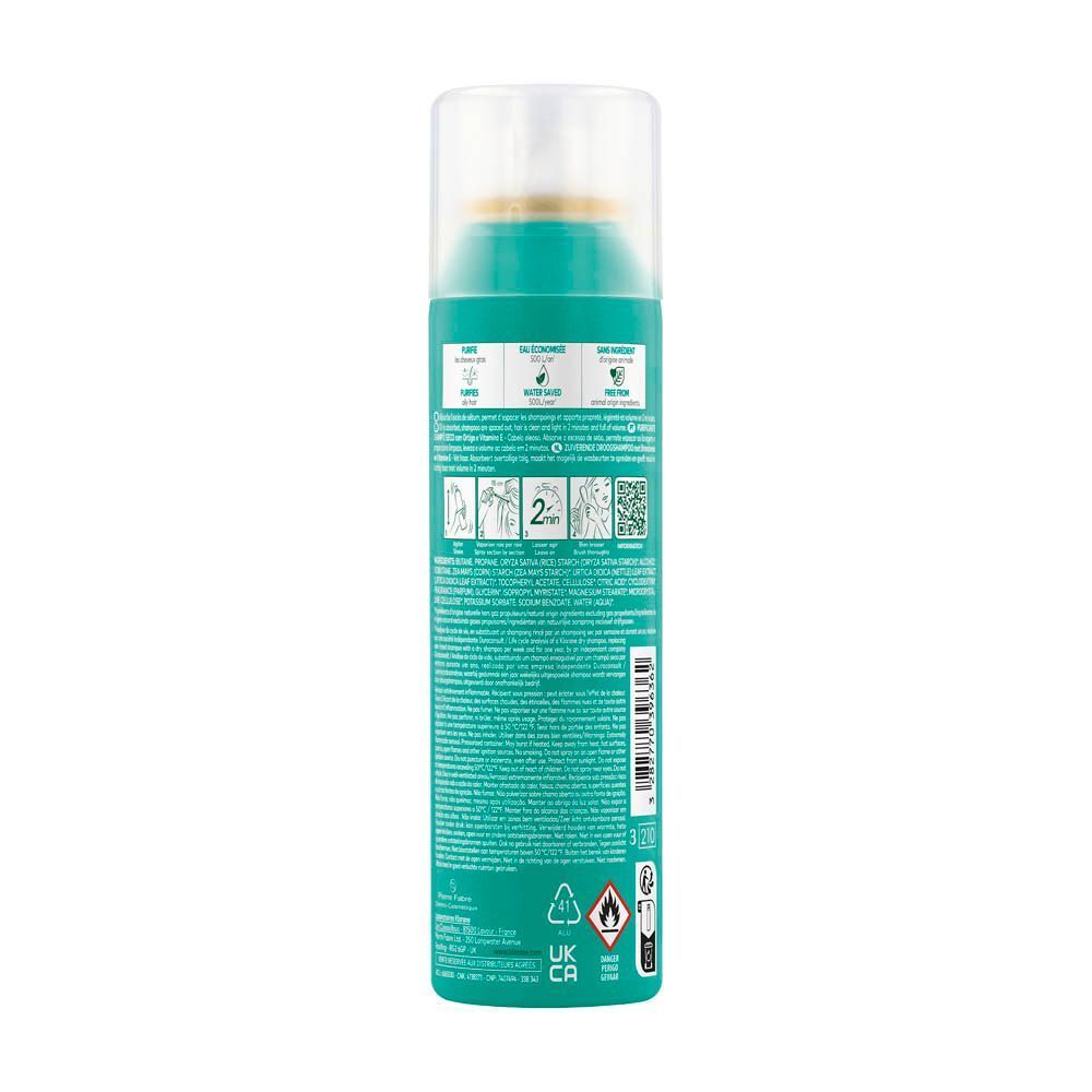Dos d'un flacon spray vert. Informations et pictogrammes.