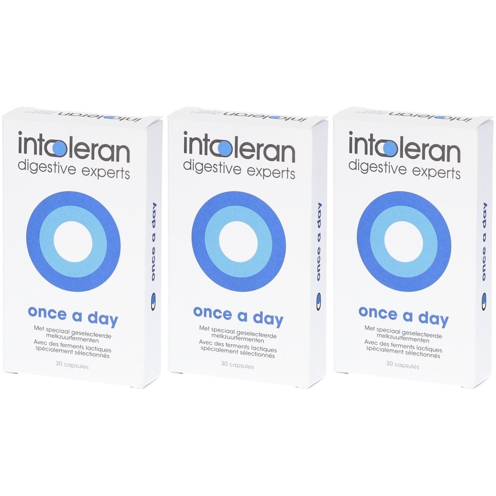 Trois boîtes blanches avec le nom du produit et l'inscription "once a day". Cercles bleus sur le devant. Texte en allemand, néerlandais et français.