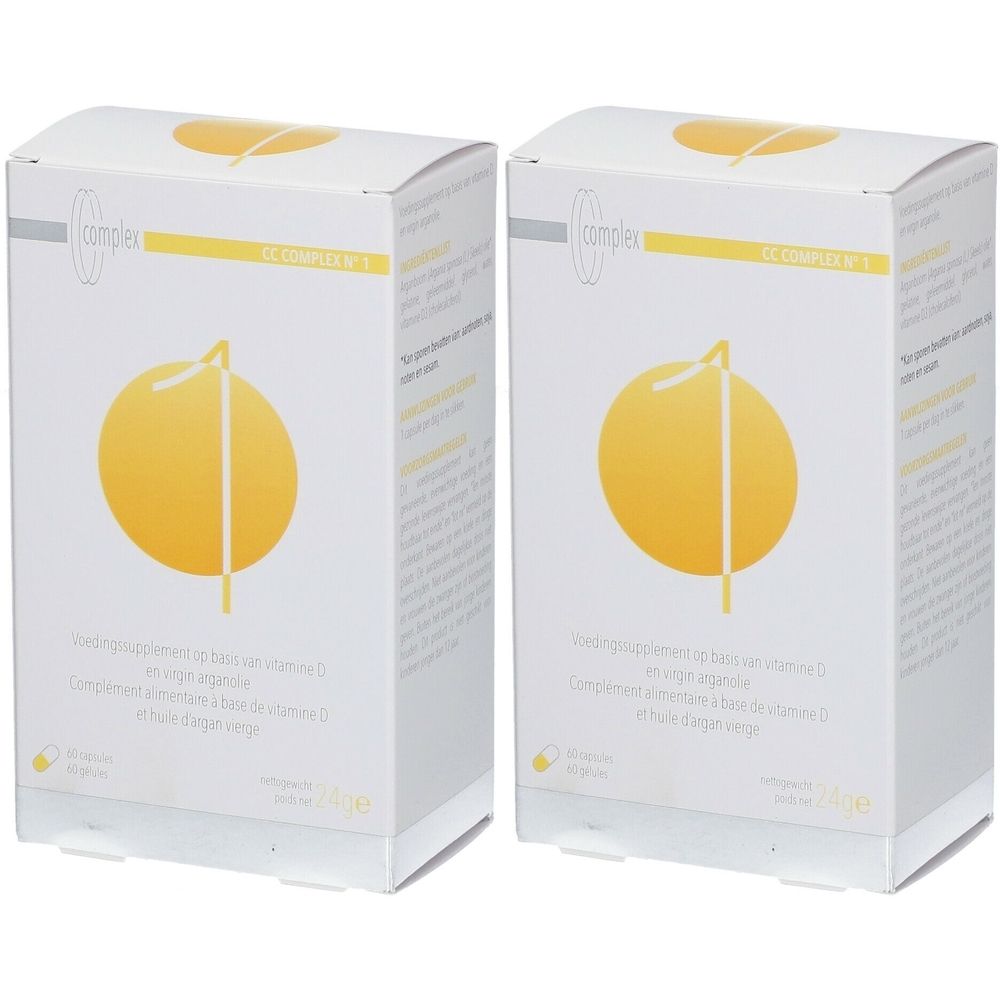 Deux boîtes blanches avec un cercle jaune. Inscription: CC Complex N°1 Vitamine D. Texte en plusieurs langues.