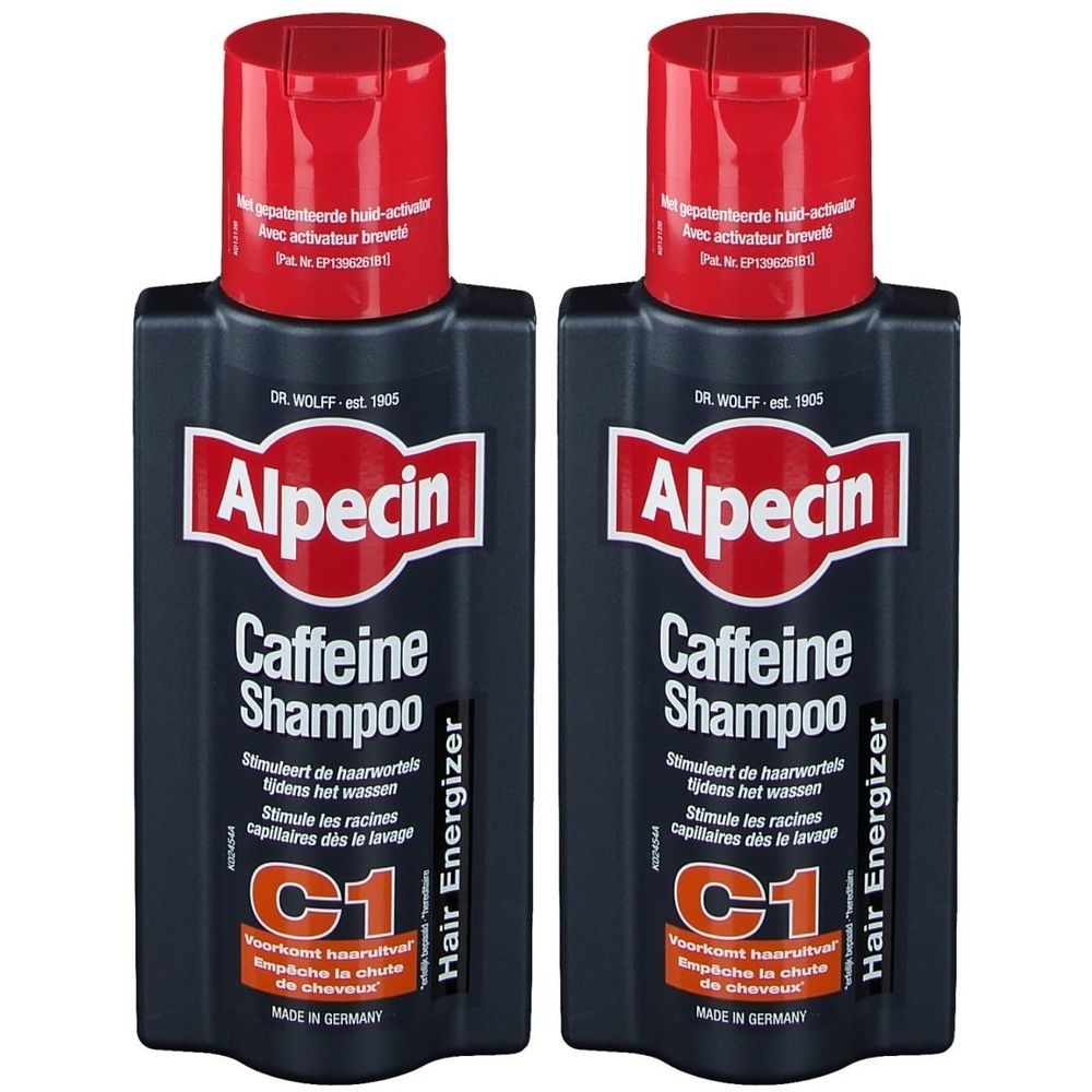 Zwei Flaschen Alpecin Caffein Shampoo. Schwarze Flaschen mit rotem Verschluss. Weiße Schrift.