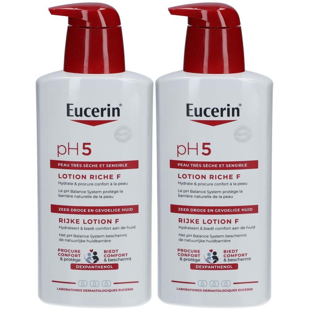 Zwei weiße Flaschen mit rotem Pumpkopf. Aufschrift: Eucerin pH5 Lotion Riche F. Text in französischer und niederländischer Sprache.