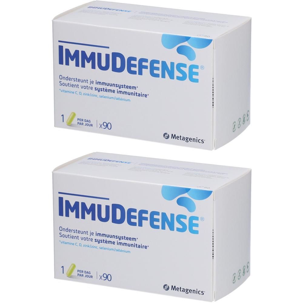 Deux boîtes blanches avec le texte bleu IMMUDEFENSE. Contient 90 comprimés. Logo Metagenics.