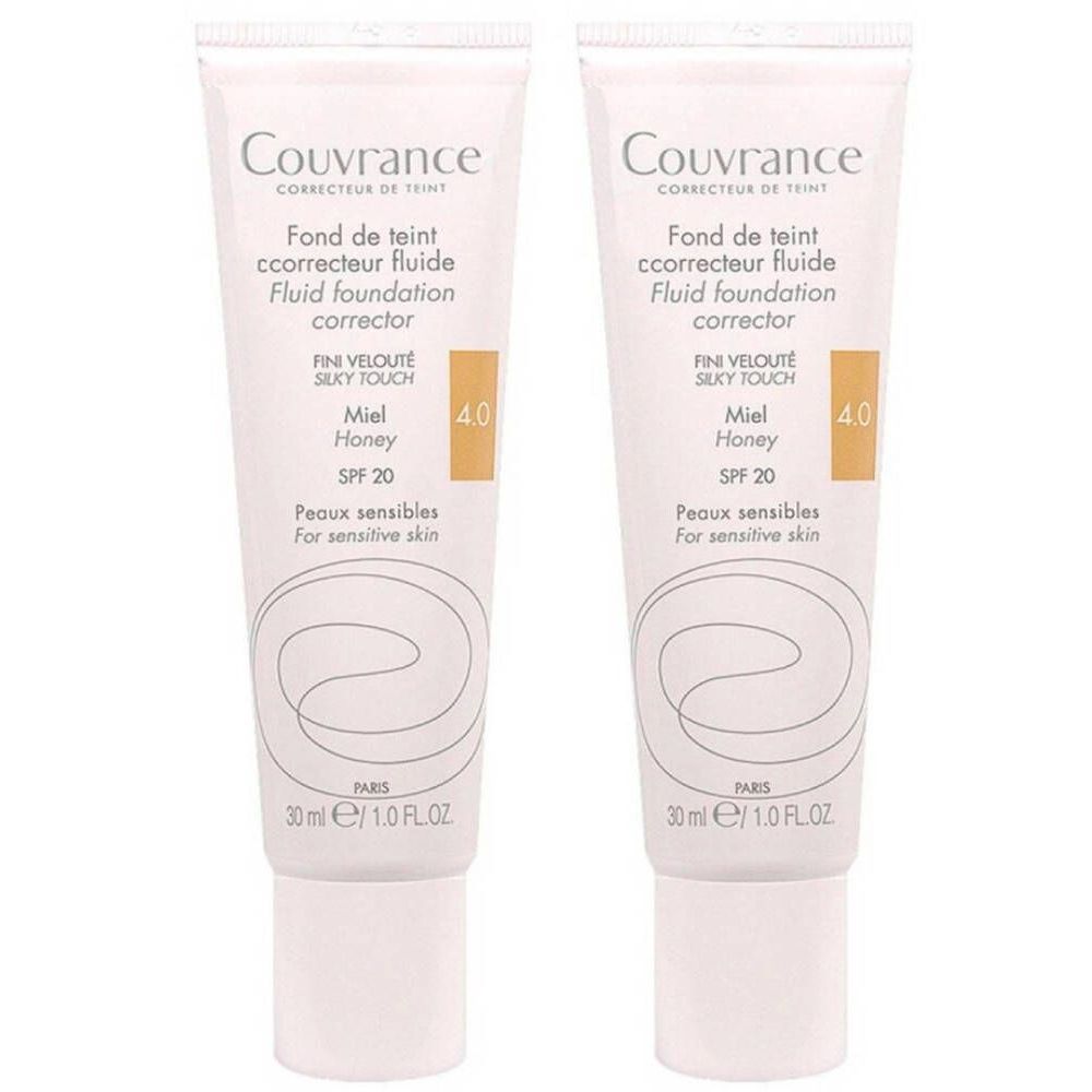 Deux tubes de fond de teint Couvrance, teinte 4.0 Honey. Inscription: Fluid Foundation Corrector, SPF 20, pour peaux sensibles.