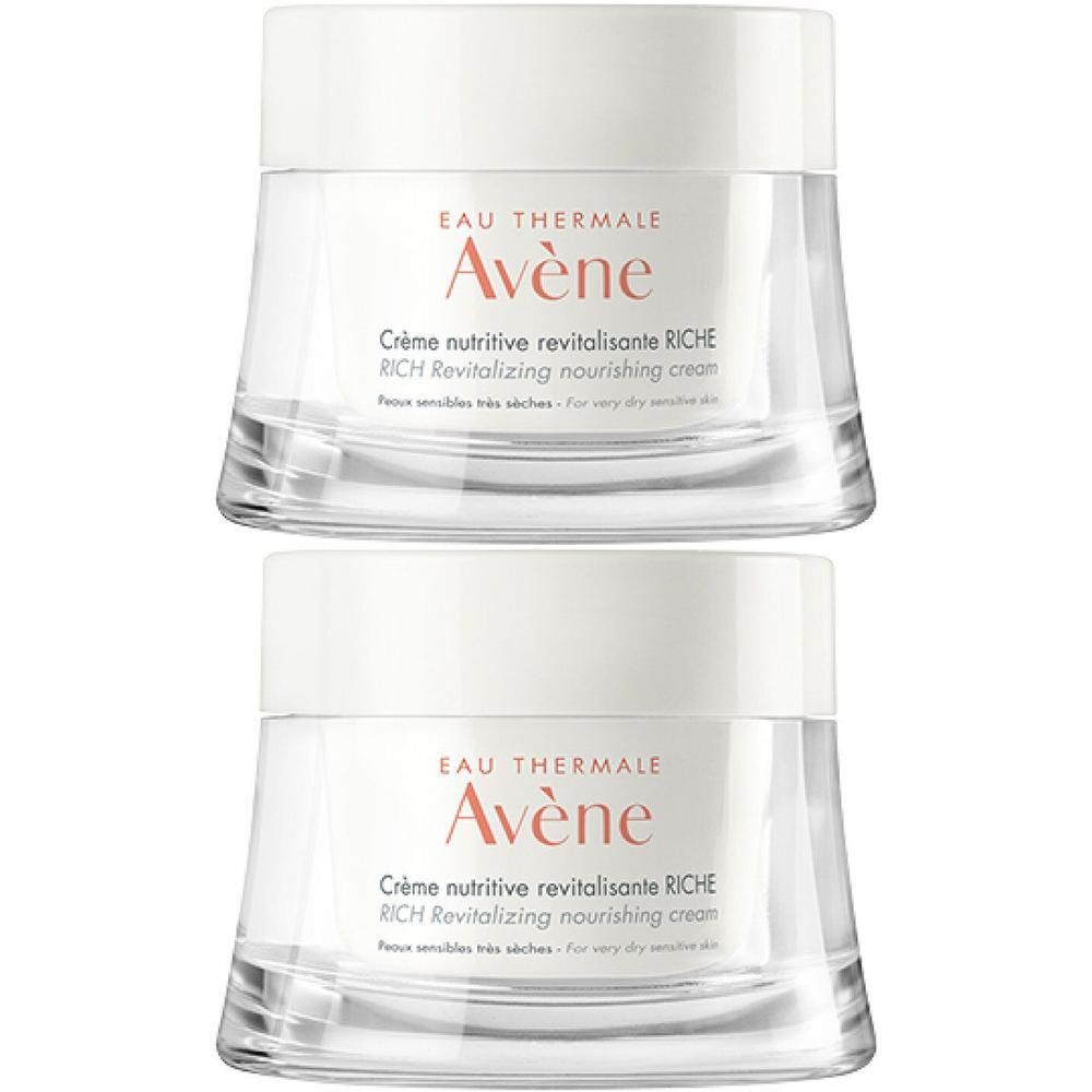 Zwei Cremetiegel mit weißem Deckel und transparentem Glas. Aufschrift: Eau Thermale Avène, Crème nutritive revitalisante RICHE.