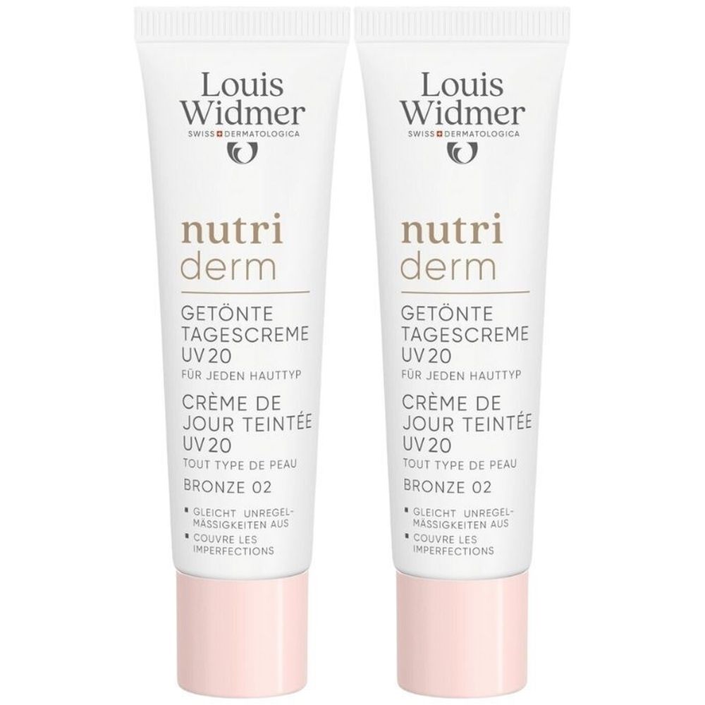 Deux tubes de crème de jour teintée Louis Widmer Nutriderm UV20 Bronze 02. Tubes blancs, texte et bouchon rose.