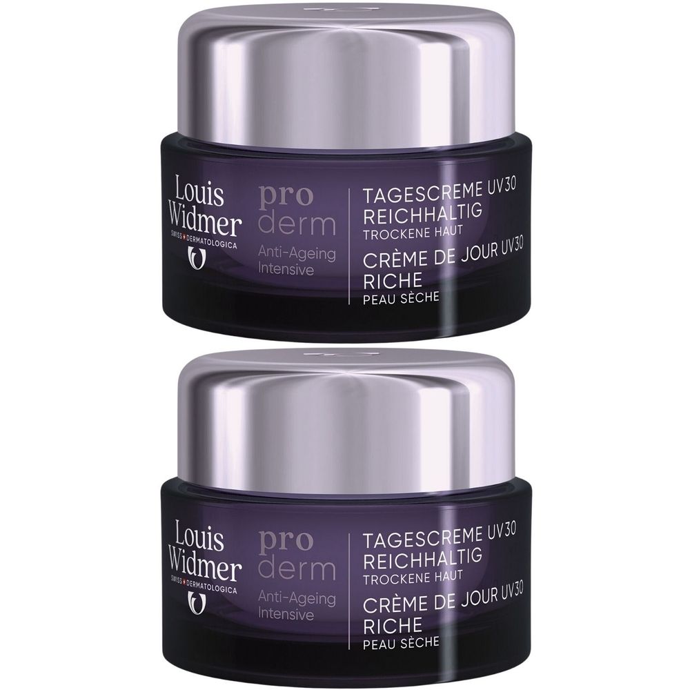 Deux pots de crème de jour Louis Widmer Proderm UV30. Pots violets foncés avec couvercles argentés. Inscription : Crème de jour riche.