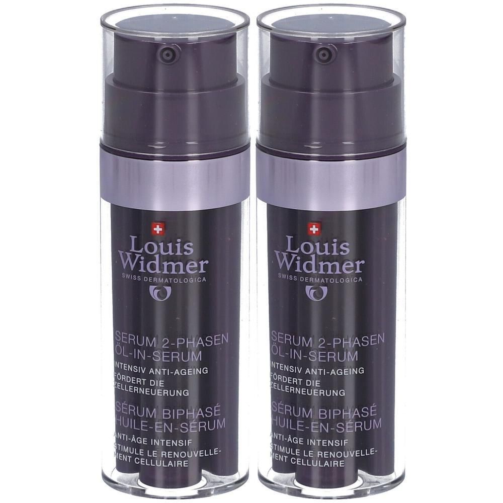 Zwei Flaschen Louis Widmer Serum. Schwarze Flaschen mit silbernen Akzenten und Dosierpumpen.