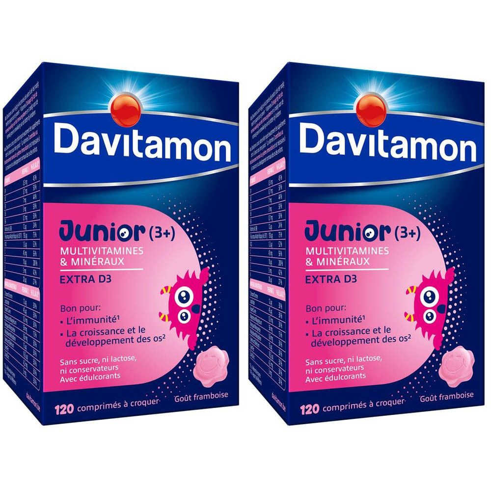 Deux boîtes Davitamon Junior (3+). Emballage bleu avec nom et informations sur le produit. Goût : Framboise.