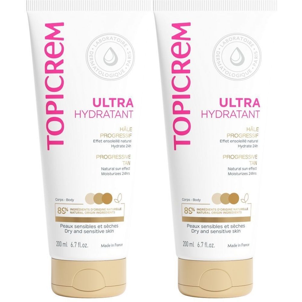 Deux tubes de Topicrem Ultra-Hydratant. Blanc avec texte rose. Inscription: Ultra Hydratant, Hâle Progressif. Bouchon beige.