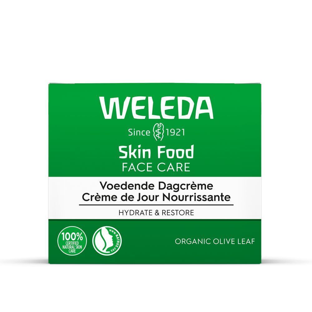 Grüne Verpackung mit weißem Text. Aufschrift: WELEDA Skin Food FACE CARE, Voedende Dagcrème, Crème de Jour Nourrissante. Mit Logos.
