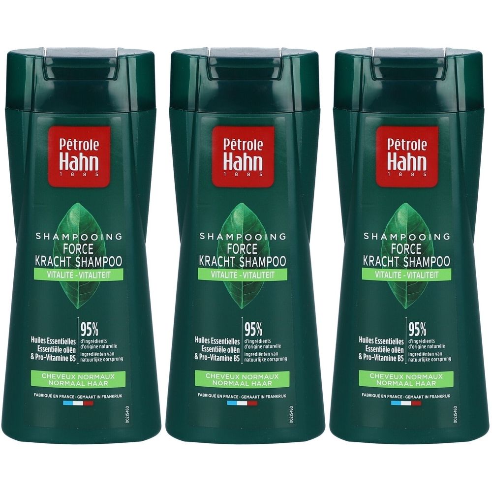 Drei grüne Shampoo-Flaschen. Aufschrift: Petrole Hahn, Shampooing Force Vitalité. Enthält ätherische Öle und Pro-Vitamin B5.