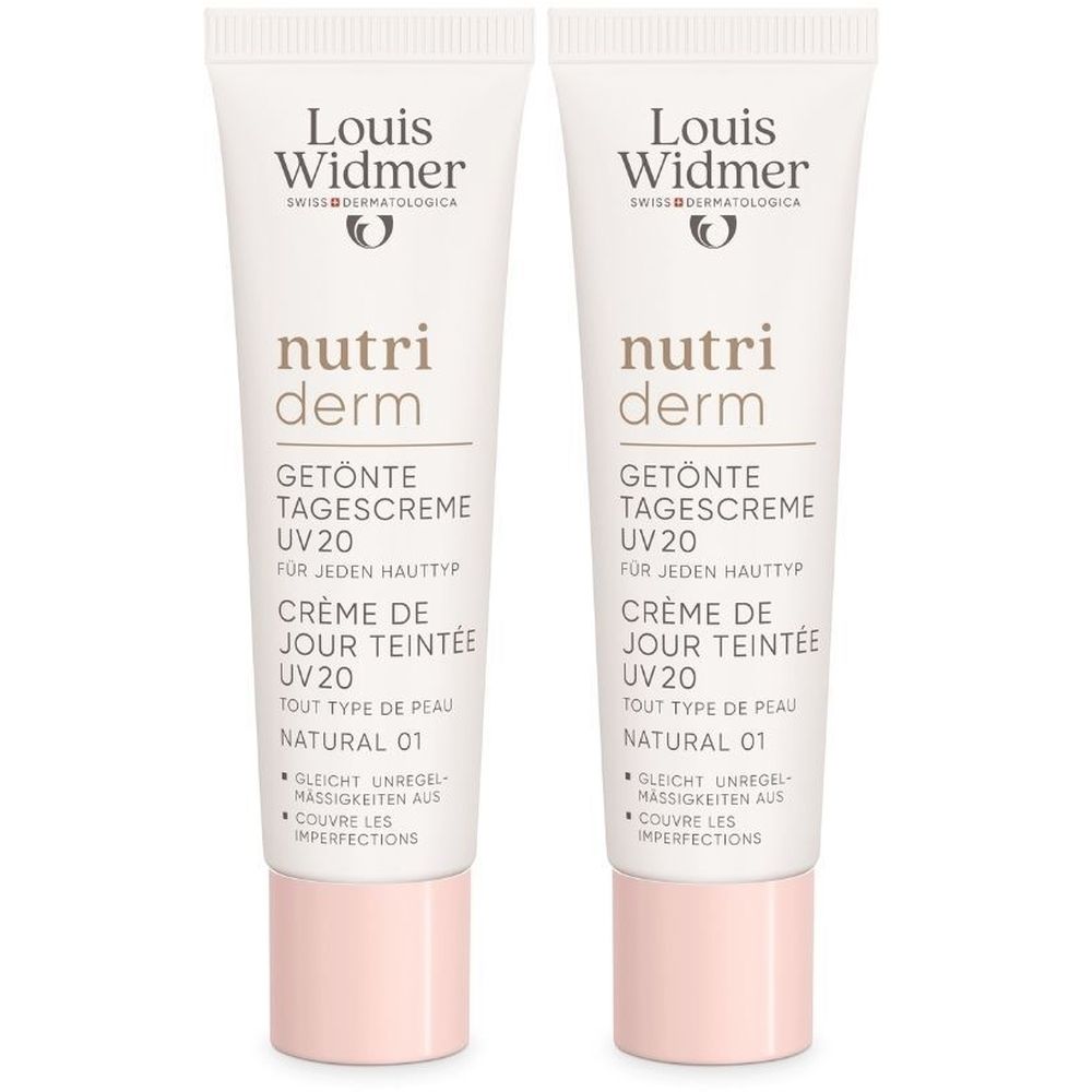 Deux tubes de crème de jour teintée Louis Widmer Nutriderm UV20 Natural 01. Tubes blancs avec texte et bouchon rose.