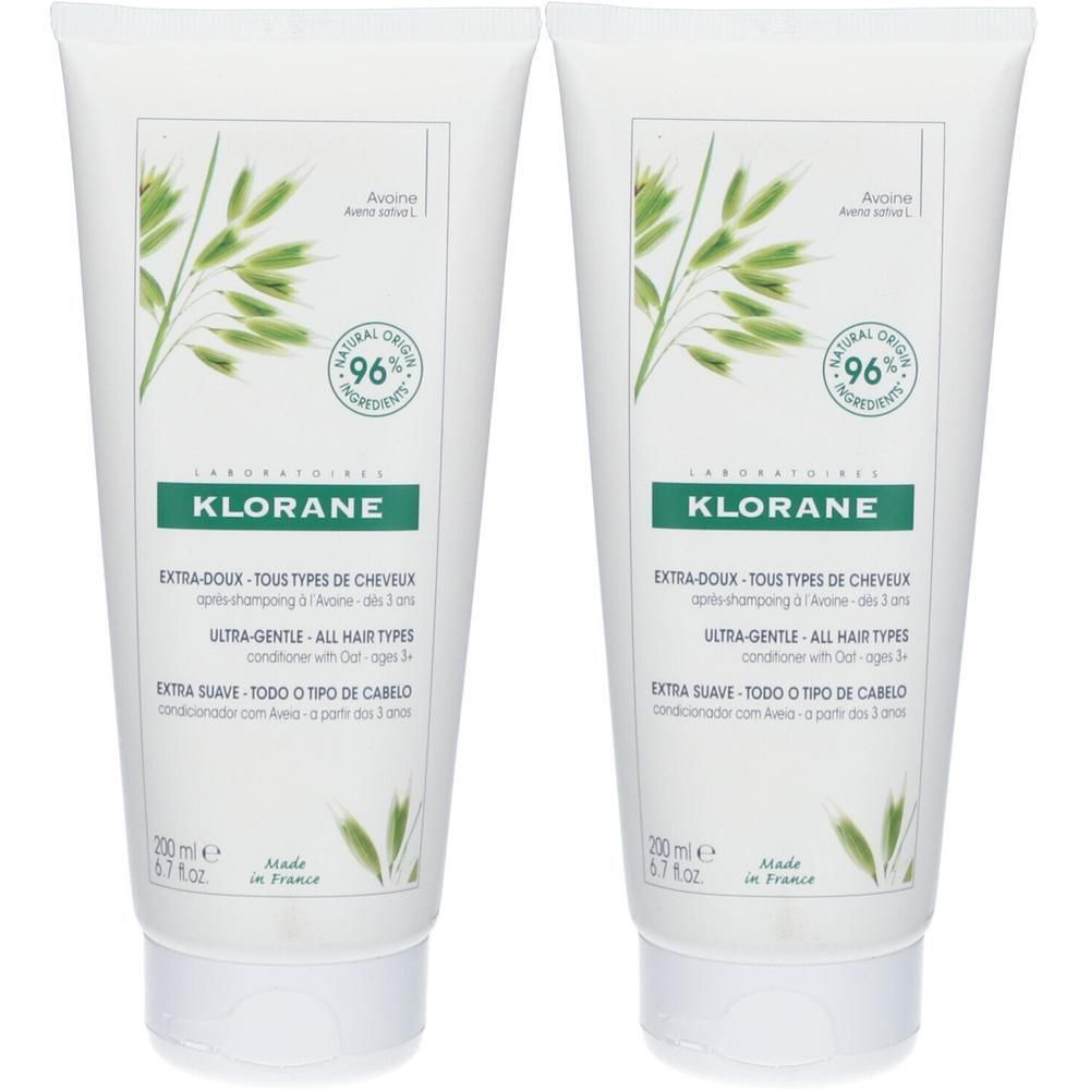 Zwei Tuben KLORANE Hafermilch Balsam. Weiße Tuben mit grünen Akzenten und Produktinformationen. 96% natürliche Inhaltsstoffe.